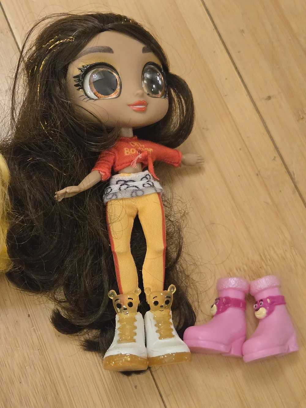 Yellow-Haired Fashion Doll with Curly Hair and Trendy Outfit